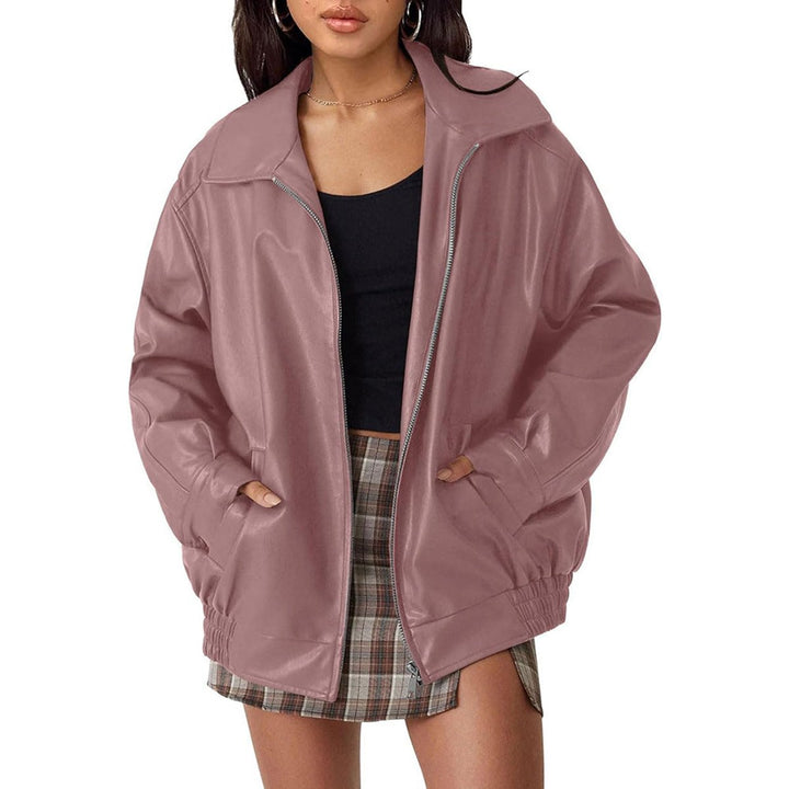 Woman wearing an oversized faux leather bomber jacket with a point collar